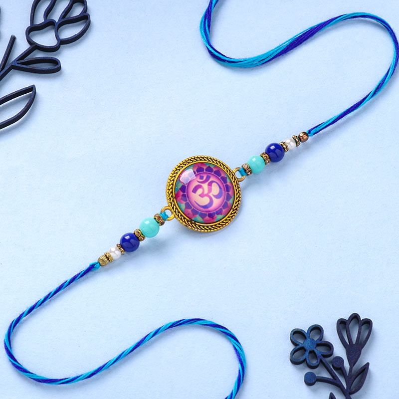 Om Dial Beaded Blue Rakhi